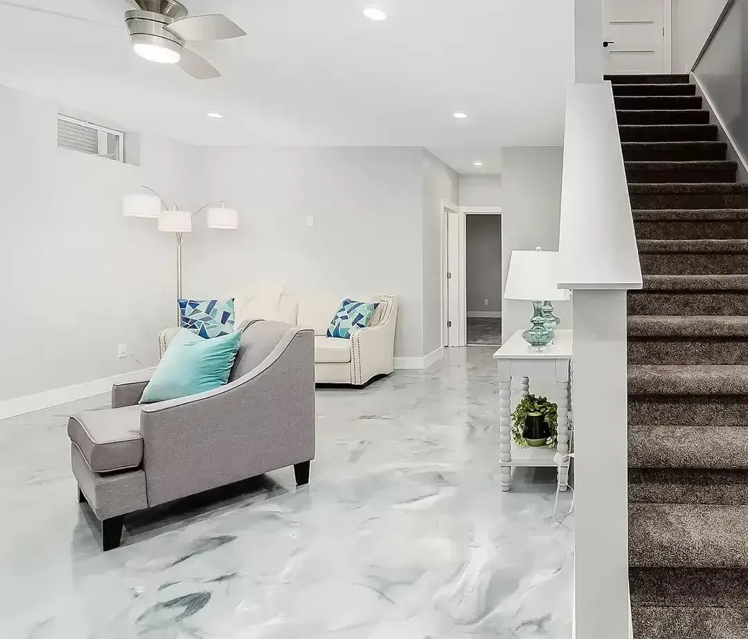 Finished basement living room with a white metallic floor